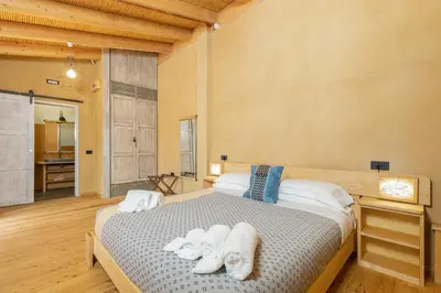 Letto o letti in una camera di Domu Bresca