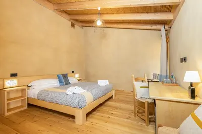 Letto o letti in una camera di Domu Bresca