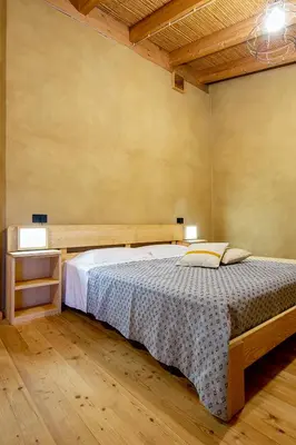 Letto o letti in una camera di Domu Bresca