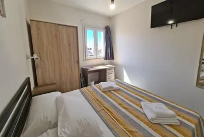 Letto o letti in una camera di Civico 14 Apartment 4