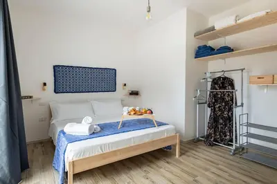 Letto o letti in una camera di KT House - Tortolì