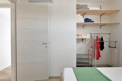 Letto o letti in una camera di KT House - Tortolì