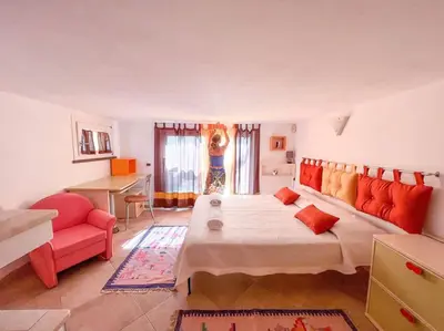 Letto o letti in una camera di Hibryd: in centro, a due passi dal mare