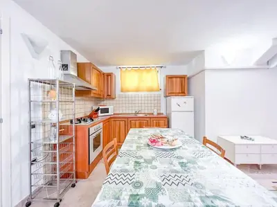 Cucina o angolo cottura di Hibryd: in centro, a due passi dal mare
