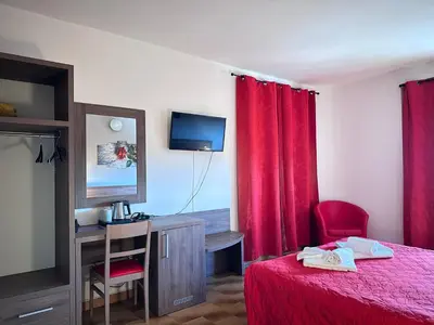 Letto o letti in una camera di Hotel Miramonti Seulo Turismo Rurale