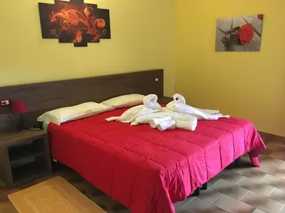 Letto o letti in una camera di Hotel Miramonti Seulo Turismo Rurale
