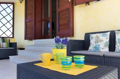 Area soggiorno di Villa Regina - Doppia villetta vista mare con giardino e BBQ