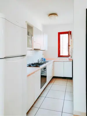 Cucina o angolo cottura di Incantevole appartamento al primo piano con terrazzo