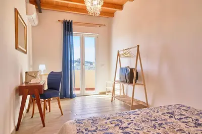 Letto o letti in una camera di Appartamento Cagliari, OliveOyl Apt&Terrace