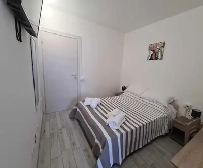 Letto o letti in una camera di Civico 14 Apartment 4B