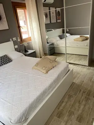 Letto o letti in una camera di affitto turistico Lavigna24