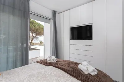 Letto o letti in una camera di Luxury beach front