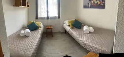 Letto o letti in una camera di Casa vacanze a tre minuti a piedi dal mare