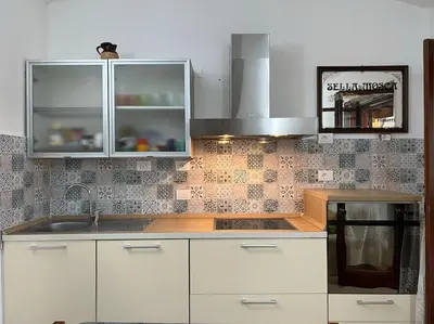 Cucina o angolo cottura di Casa vacanze a tre minuti a piedi dal mare