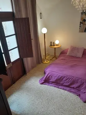 Letto o letti in una camera di Da Julia