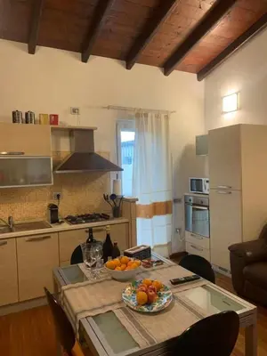 Cucina o angolo cottura di PiazzaItaliaSuite appartamento con terrazza