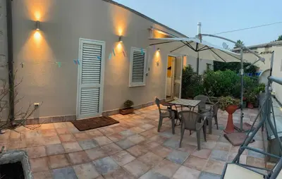 Patio o area all'aperto di PiazzaItaliaSuite appartamento con terrazza