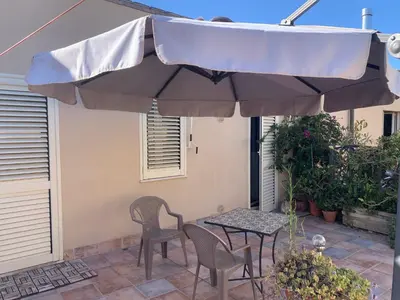 Patio o area all'aperto di PiazzaItaliaSuite appartamento con terrazza