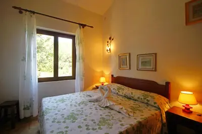 Letto o letti in una camera di Villetta Marina Holidays