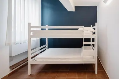Letto o letti in una camera di OSTELLO HENRY