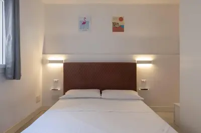 Letto o letti in una camera di Casa Violetta