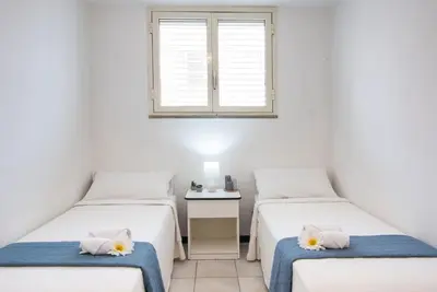 Letto o letti in una camera di [Torregrande]APT.1-Con terrazzo a pochi metri dal mare - Free Wi-Fi
