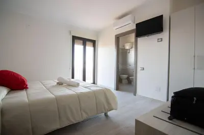 Letto o letti in una camera di La Finestra Sul Mare