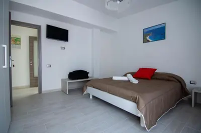 Letto o letti in una camera di La Finestra Sul Mare