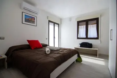 Letto o letti in una camera di La Finestra Sul Mare
