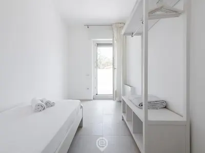 Letto o letti in una camera di Sandy Retreat, Beachside Apartment with Terrace