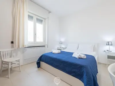 Letto o letti in una camera di Sandy Retreat, Beachside Apartment with Terrace