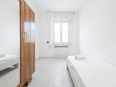 Letto o letti in una camera di Sandy Retreat, Beachside Apartment with Terrace