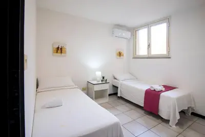 Letto o letti in una camera di [Torregrande]APT.2 - Vicino al mare - Free Wi-Fi