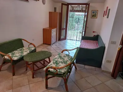 Area soggiorno di Casa Pepe, Confortevole villetta con giardino a 2 min dal mare