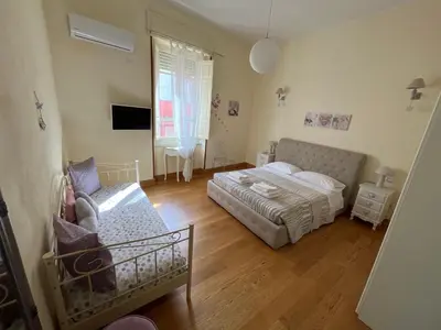 Letto o letti in una camera di Appartamento centro storico Cagliari - Alter Nos house