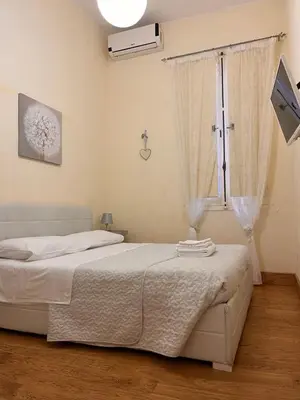 Letto o letti in una camera di Appartamento centro storico Cagliari - Alter Nos house