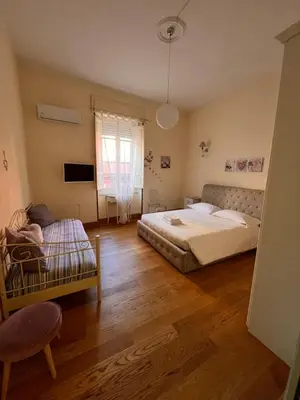 Letto o letti in una camera di Appartamento centro storico Cagliari - Alter Nos house