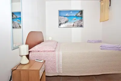 Letto o letti in una camera di B&B Villa Tancau