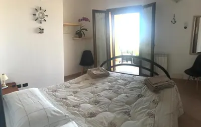 Letto o letti in una camera di B&B Villa Tancau