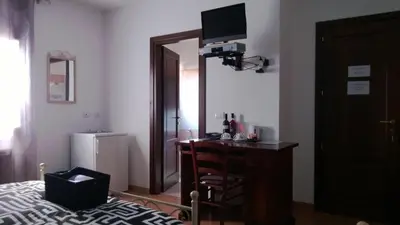 TV o dispositivi per l'intrattenimento presso Affittacamere Le Statue Del Sinis