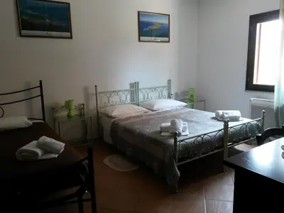 Letto o letti in una camera di Affittacamere Le Statue Del Sinis