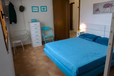 Letto o letti in una camera di Calasetta Comfy Apartment x5 - w/ Terrace