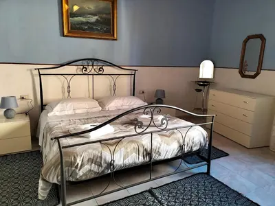 Letto o letti in una camera di Casa vacanze Antonella