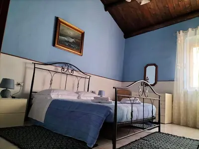 Letto o letti in una camera di Casa vacanze Antonella