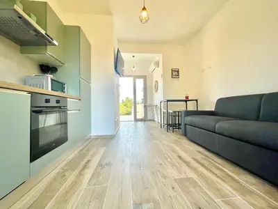 Cucina o angolo cottura di Le Corti Sarde Beach Apartments
