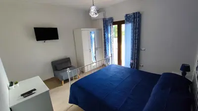 TV o dispositivi per l'intrattenimento presso Casa vacanze Tortolì