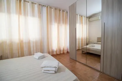 Letto o letti in una camera di Casa Wendy