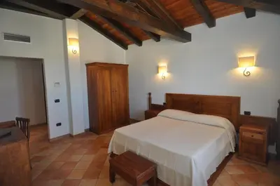 Letto o letti in una camera di Cala Luas Resort