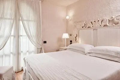 Letto o letti in una camera di La Villa Del Re - Adults Only - Small Luxury Hotels of the World