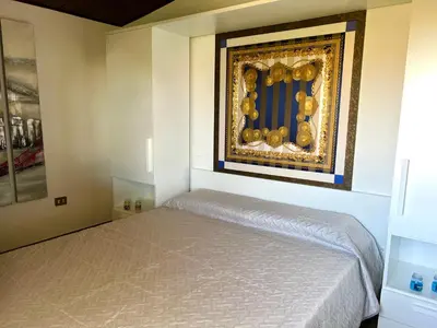 Letto o letti in una camera di Casale fronte mare - villa with swimming pool in front of the beach